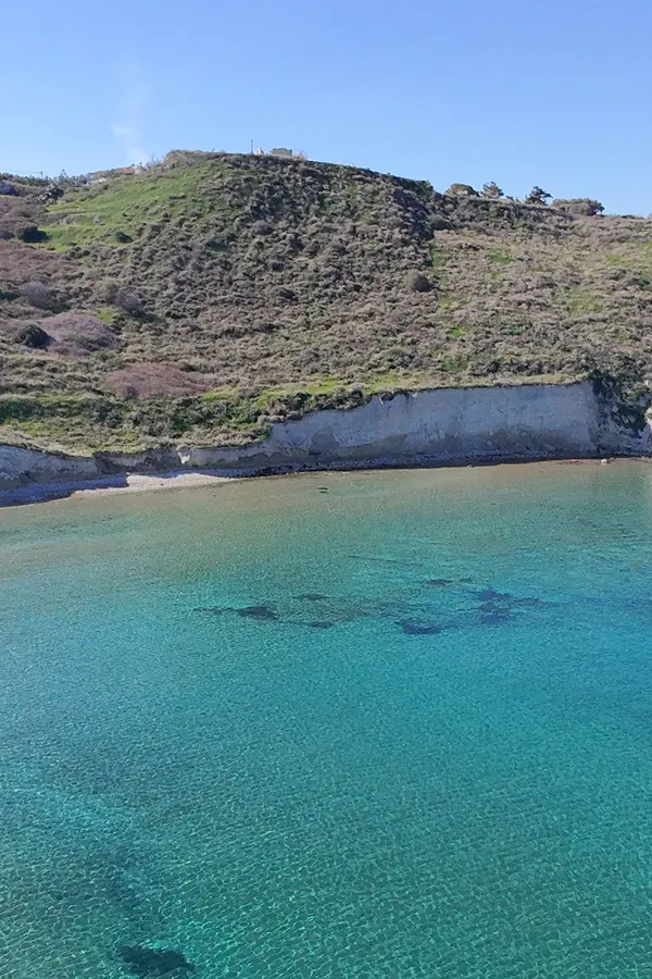 View of the natural sandy coastline and crystal-clear waters at Kera beach in Crete.